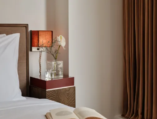 Book on a bed at Mint House